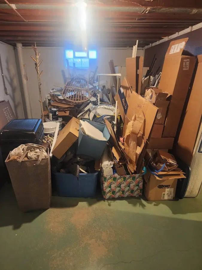 Roll-off dumpster container at job site for 2 Yard Dumpster Rental in Lahaina